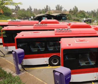 Electric buses at charging stations