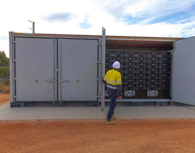 Staff installing batteries.