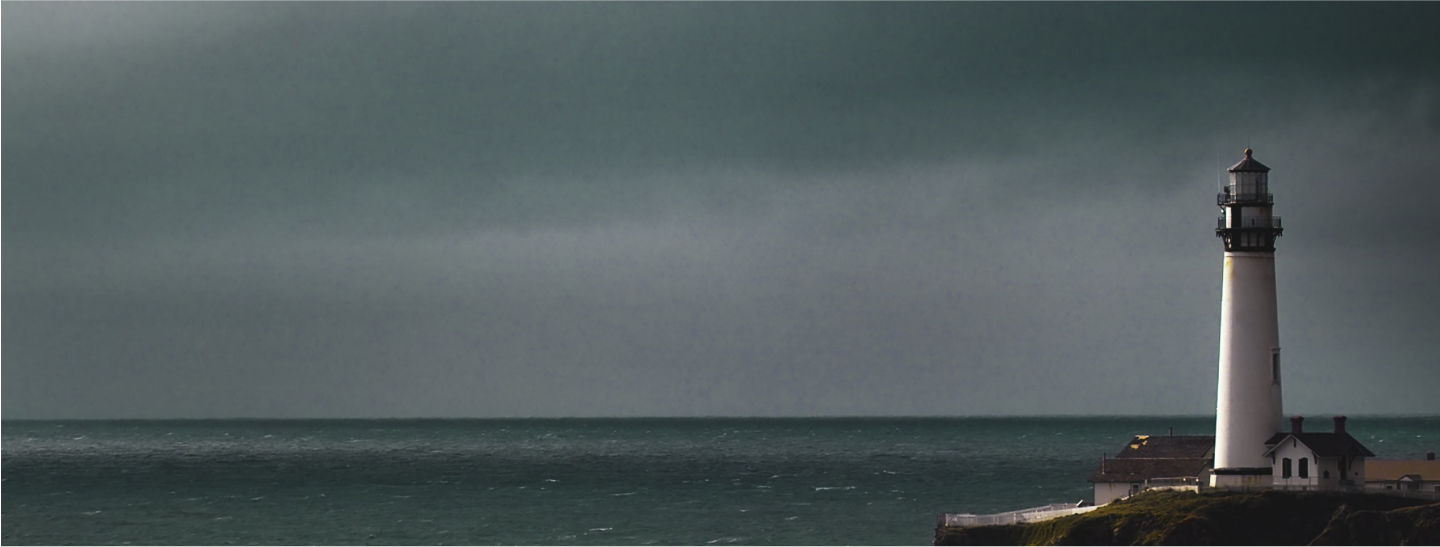 A lighthouse on a stormy coastline