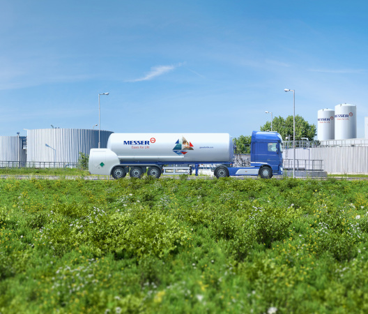 Messer industrial gas facility with a tanker truck and storage tanks