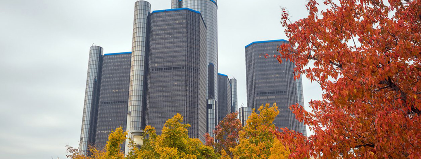 City buildings and fall leaves