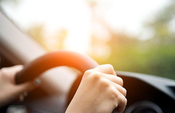 hands on steering wheel