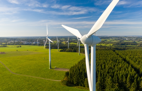 renewable energy wind turbines in a field