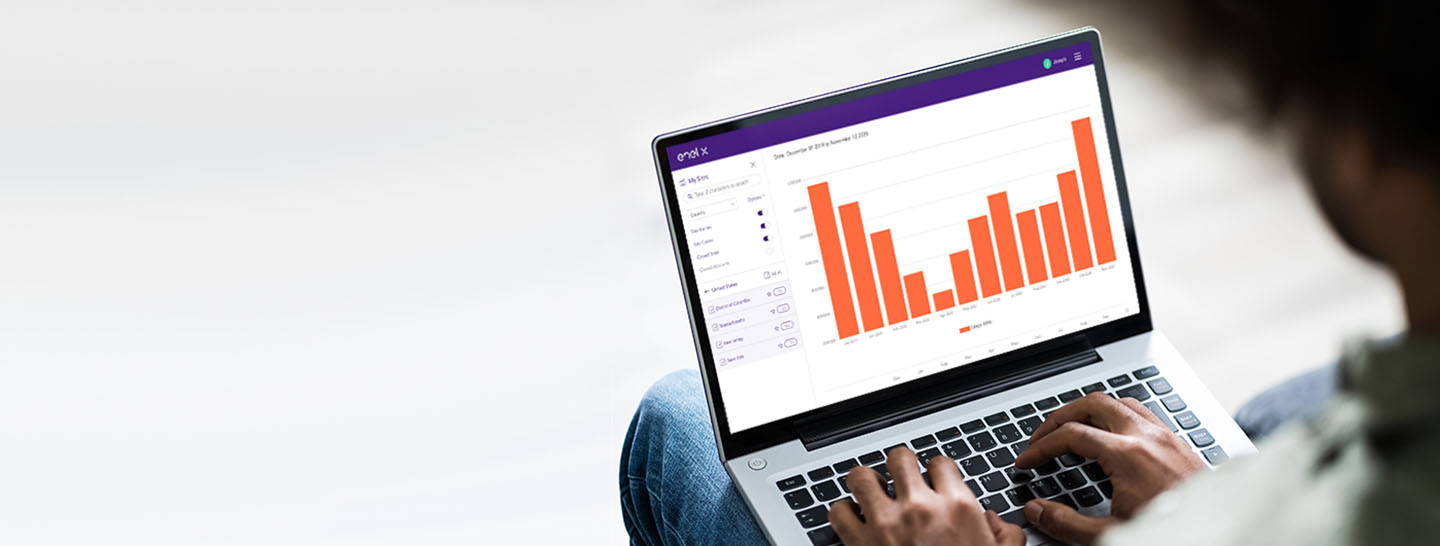 Man using Enel X Connect on a laptop