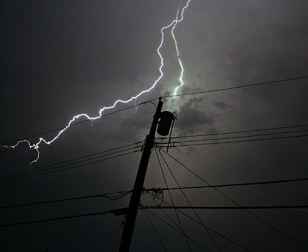 A transformer being struck by lightening.