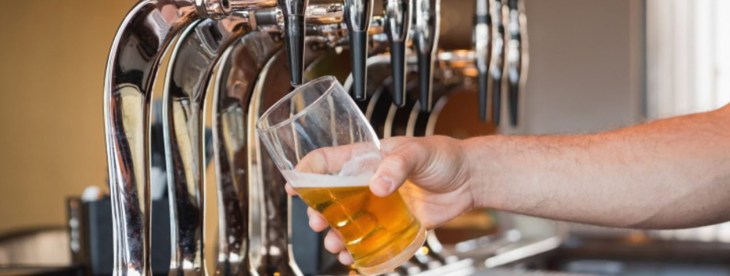 Glass being filled with beer