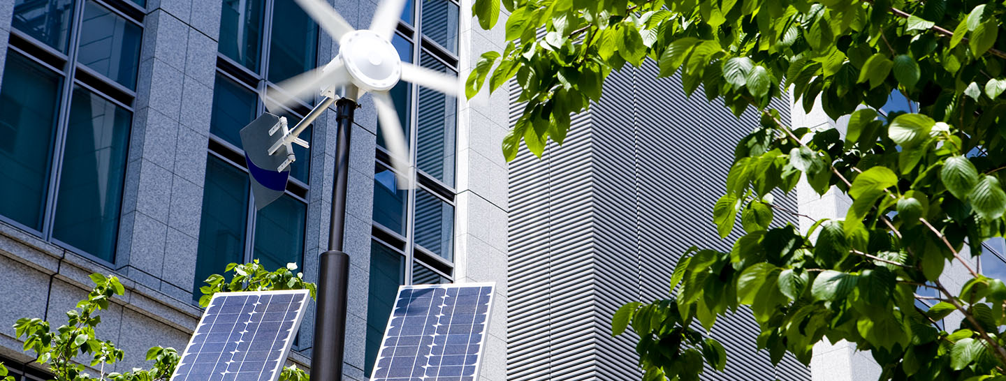 Small wind turbine and solar panels on light post