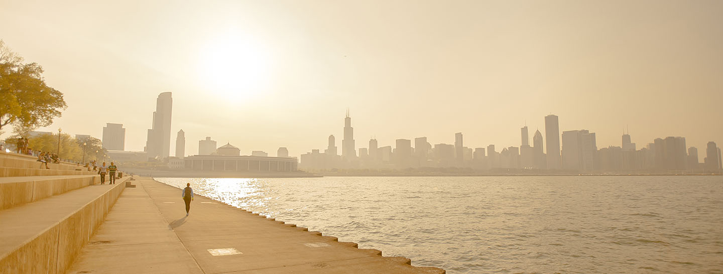 Skyline of city by the water on a hot and hazy summer day