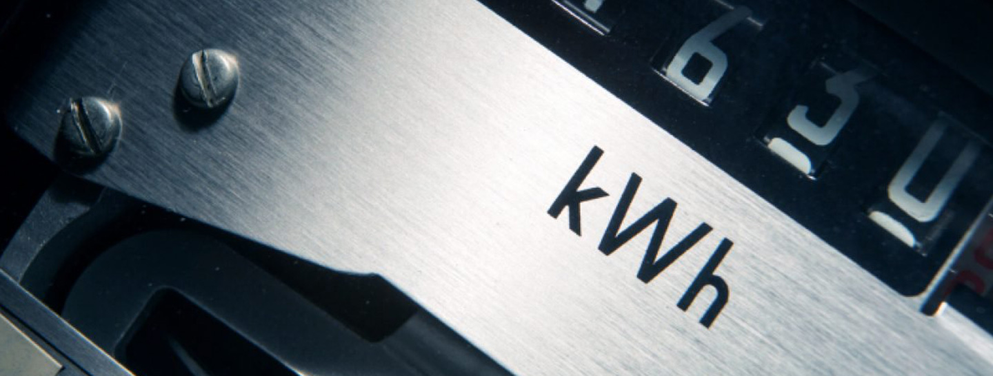 Metal engraved with the letters kWh