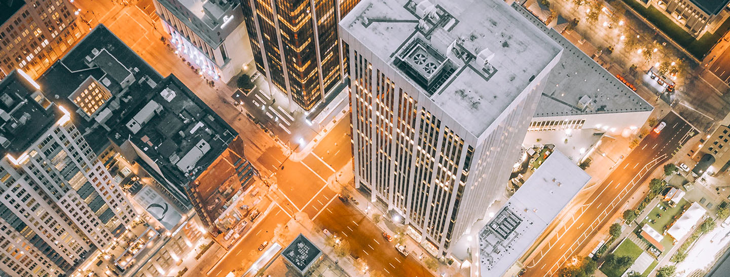 Aerial view of city at night.