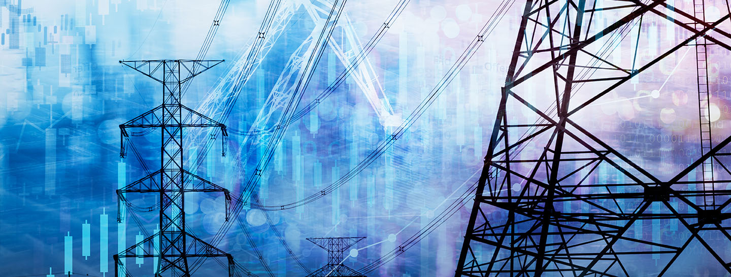 Power lines with industrial pipes in the foreground