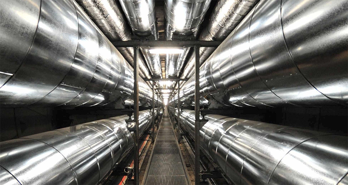 District heating pipe network in an underground utility tunnel
